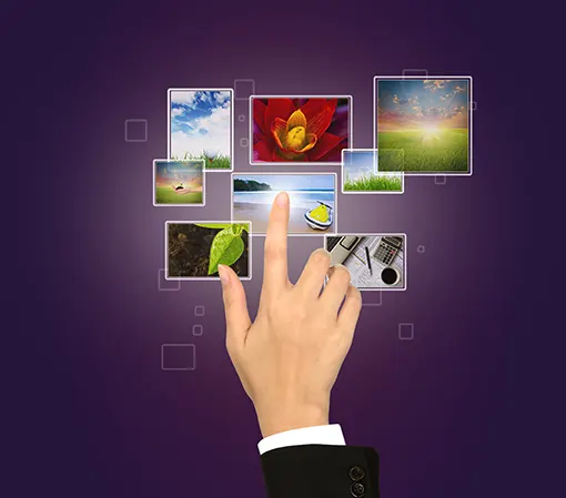 Index finger of a man in black suit selecting an image from a collection for upload front view