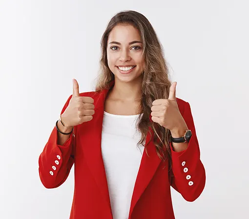 Young satisfied woman client in red suit and white shirt and brown hair showing two thumbs up front view